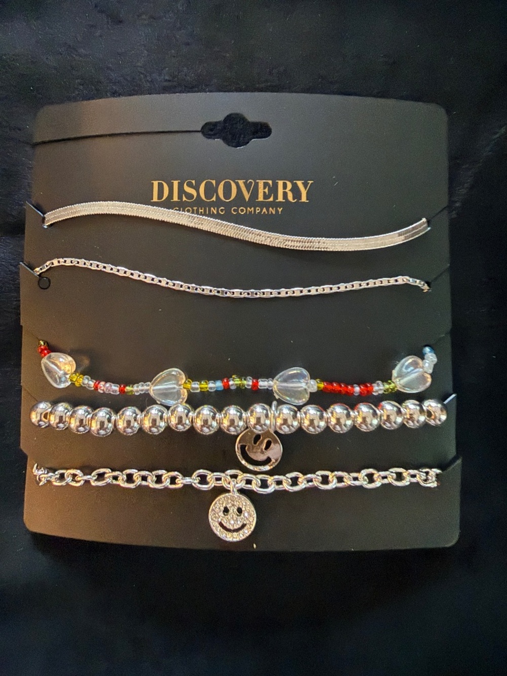 Bracelets - Silver.  5 with charms